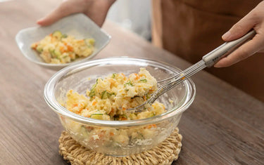 Scooping potato salad
