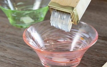 Tokoroten noodles extruding out of the tentsuki