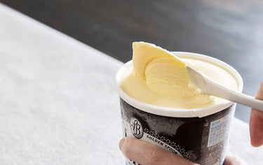 Ice cream spoon scooping ice cream