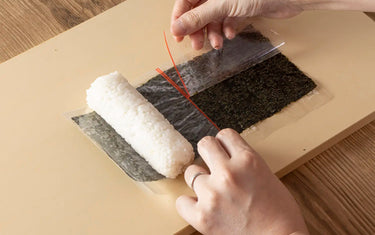 Peeling open the temakizushi wrapper