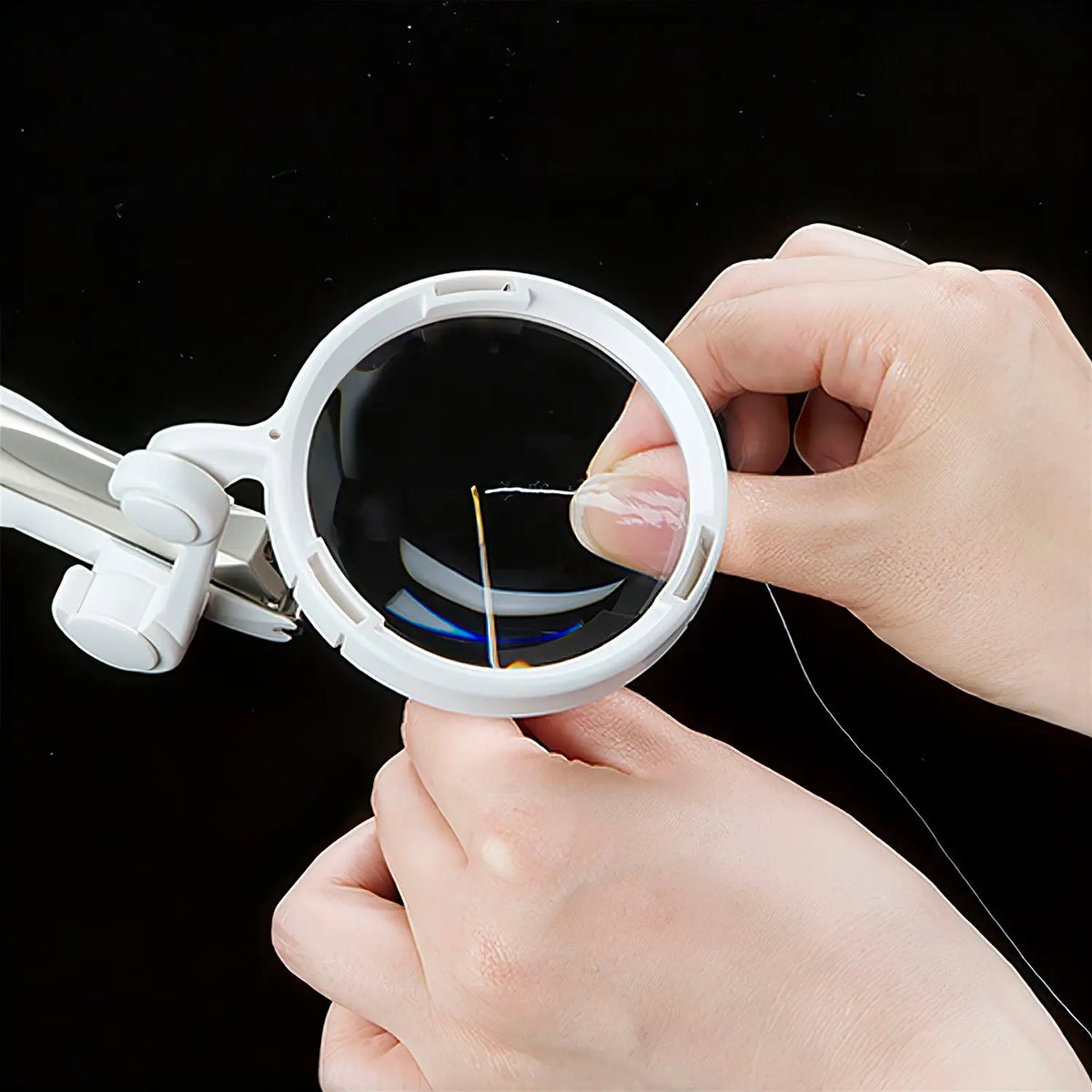 Nail clippers with magnifying glass and online light