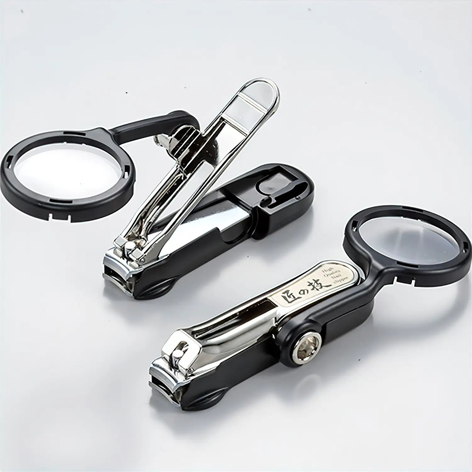 https://www.globalkitchenjapan.com/cdn/shop/files/green-bell-takuminowaza-carbon-steel-nail-clippers-with-magnifier-and-storage-bag-black-g-1223_2.webp?v=1691387719