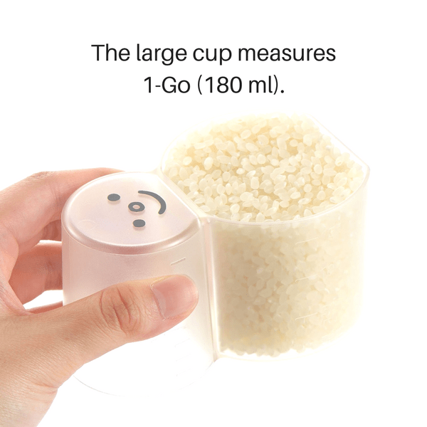 https://www.globalkitchenjapan.com/cdn/shop/products/akebono-snowman-double-sided-rice-measuring-cup-0-5-go-1-go-measuring-cups-1721476284443.png?v=1564098404