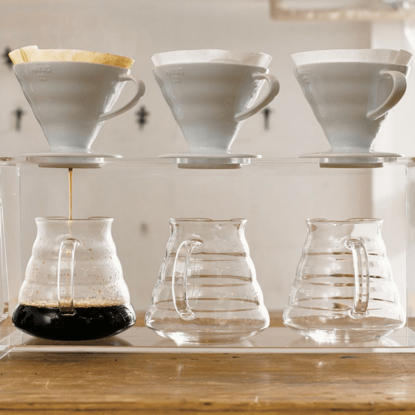 https://www.globalkitchenjapan.com/cdn/shop/products/hario-v60-handcrafted-pour-over-coffee-dripper-with-coffee-scoop-arita-porcelain-coffee-filter-cones-25217571535.png?v=1564117364